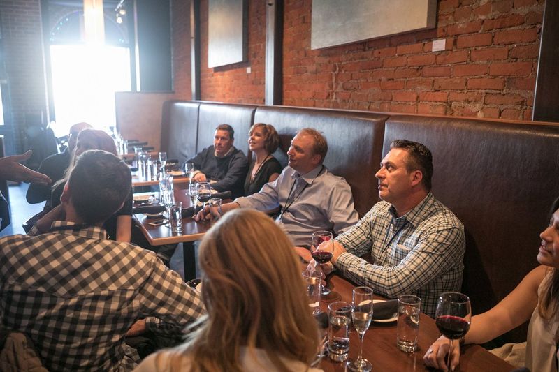 Dent attendees in conversation